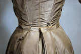Back Waist - Skirt Attaches to Bodice with Hooks & Eyes